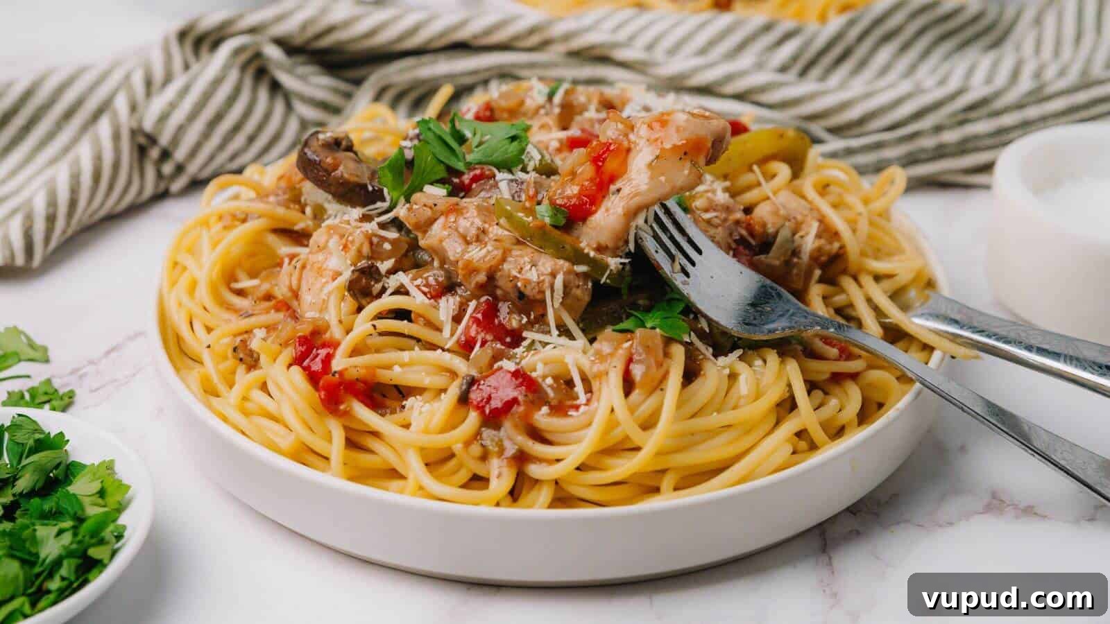 30 Flavorful Low-Carb Main Dishes That Feel Like Real Meals 14 Plate of spaghetti topped with tomato sauce, mushrooms, and herbs, with a fork and spoon on the side.
