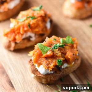 Butternut Squash Crostini with Goat Cheese and Sage 11 Butternut squash crostini on a wood board.