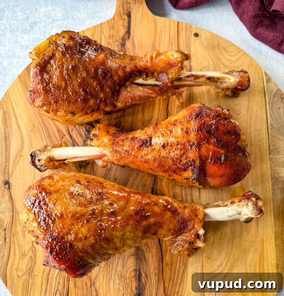 Smoky Traeger Turkey Legs Recipe: Juicy Wood-Fired Flavor 12 smoked turkey legs on a plate