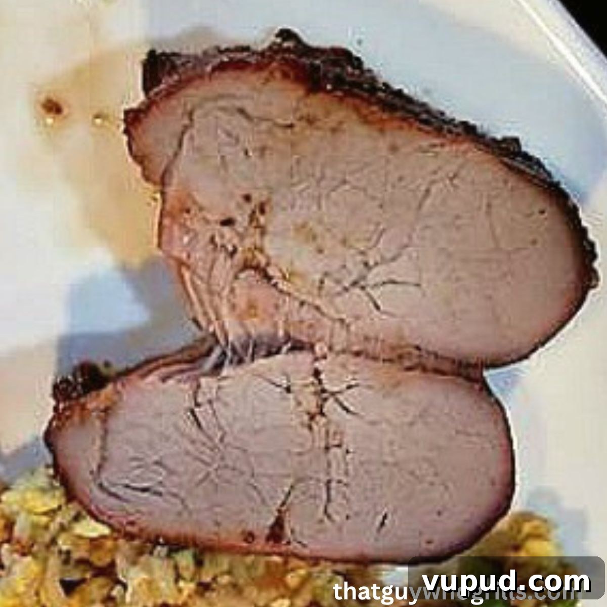 Sticky Teriyaki Grilled Pork Tenderloin Recipe 2 Grilled Pork Tenderloin On white place with fried rice