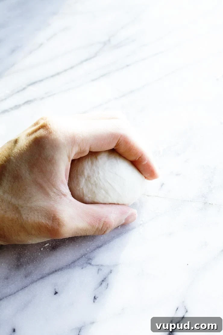 Authentic New York Bagel Recipe: Classic Boiled & Baked Method 10 How to roll dough into rounds
