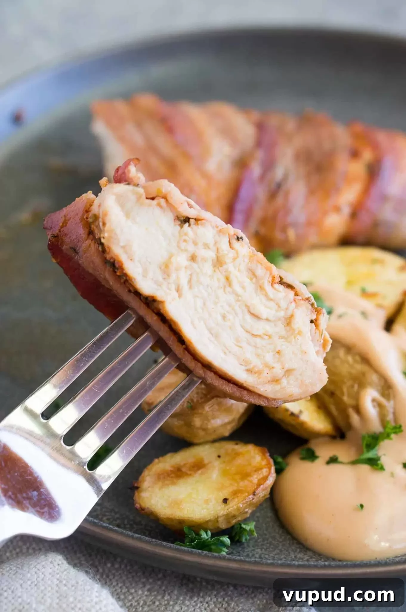 Crispy Bacon-Wrapped Chicken Breasts with Garlic Herb Glaze 6 a bite of bacon wrapped chicken