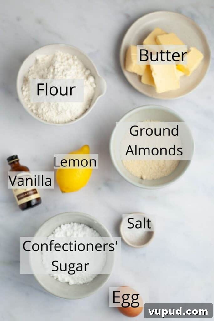 Zesty Lemon Curd Thumbprint Cookies 4 All the ingredients needed for linzer cookies weighed out in small bowls.