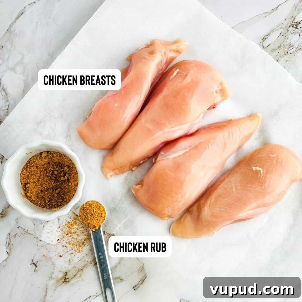 Ingredients for frozen chicken breast in instant pot on a white countertop.