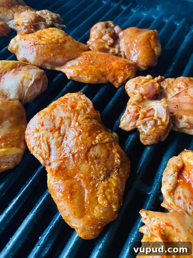Korean-Style Grilled Chicken Thighs with Sticky Gochujang Glaze 3 Chicken on the grill before cooking