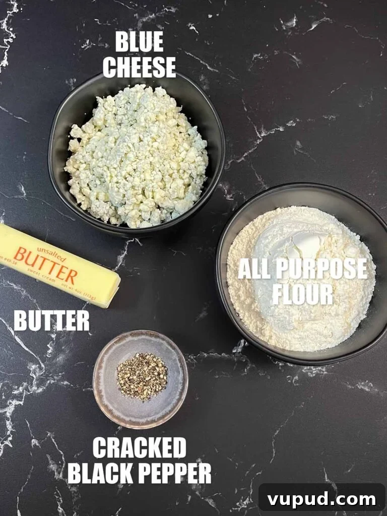 Crispy Blue Cheese Crackers: Homemade Savory Wafers Recipe 3 Blue cheese wafers recipe ingredients on a dark surface.