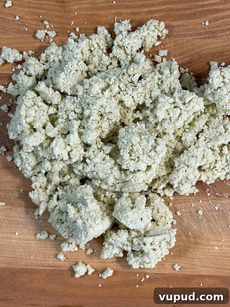 Crispy Blue Cheese Crackers: Homemade Savory Wafers Recipe 6 Blue cheese wafer dough dumped on a wooden board.