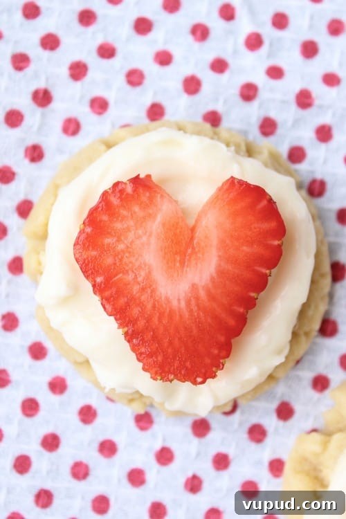 Coconut Frosted Sugar Cookies with Fresh Strawberry Hearts 5 Coconut-Frosted Sugar Cookies with Strawberry Hearts