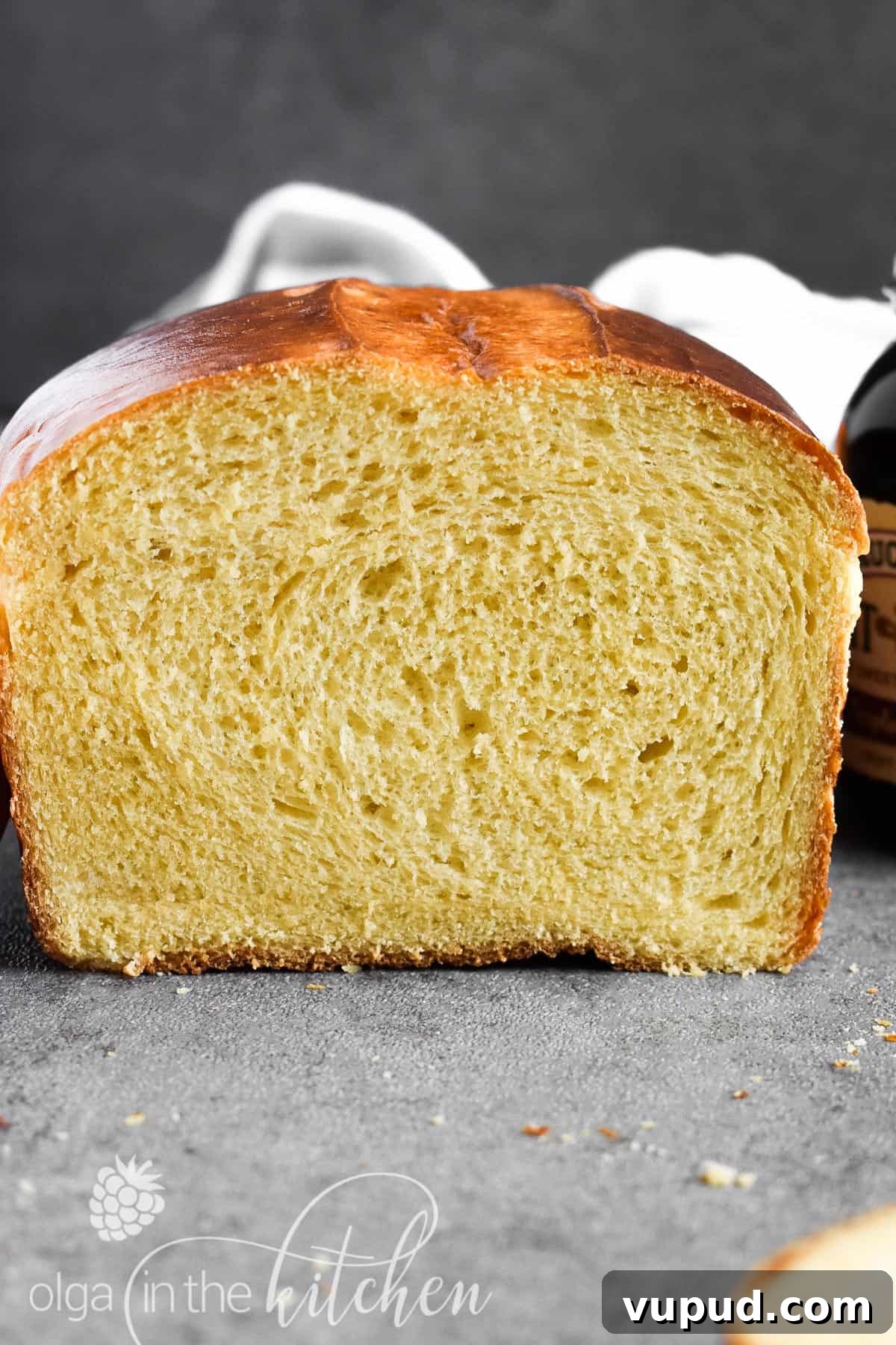 Ukrainian Pumpkin Bread is delicious any time of the year! It has a mild pumpkin flavor from homemade pumpkin puree, a yellow-ish fluffy and tender texture and a shiny dark-brown crust. pumpkin bread using homemade pumpkin puree