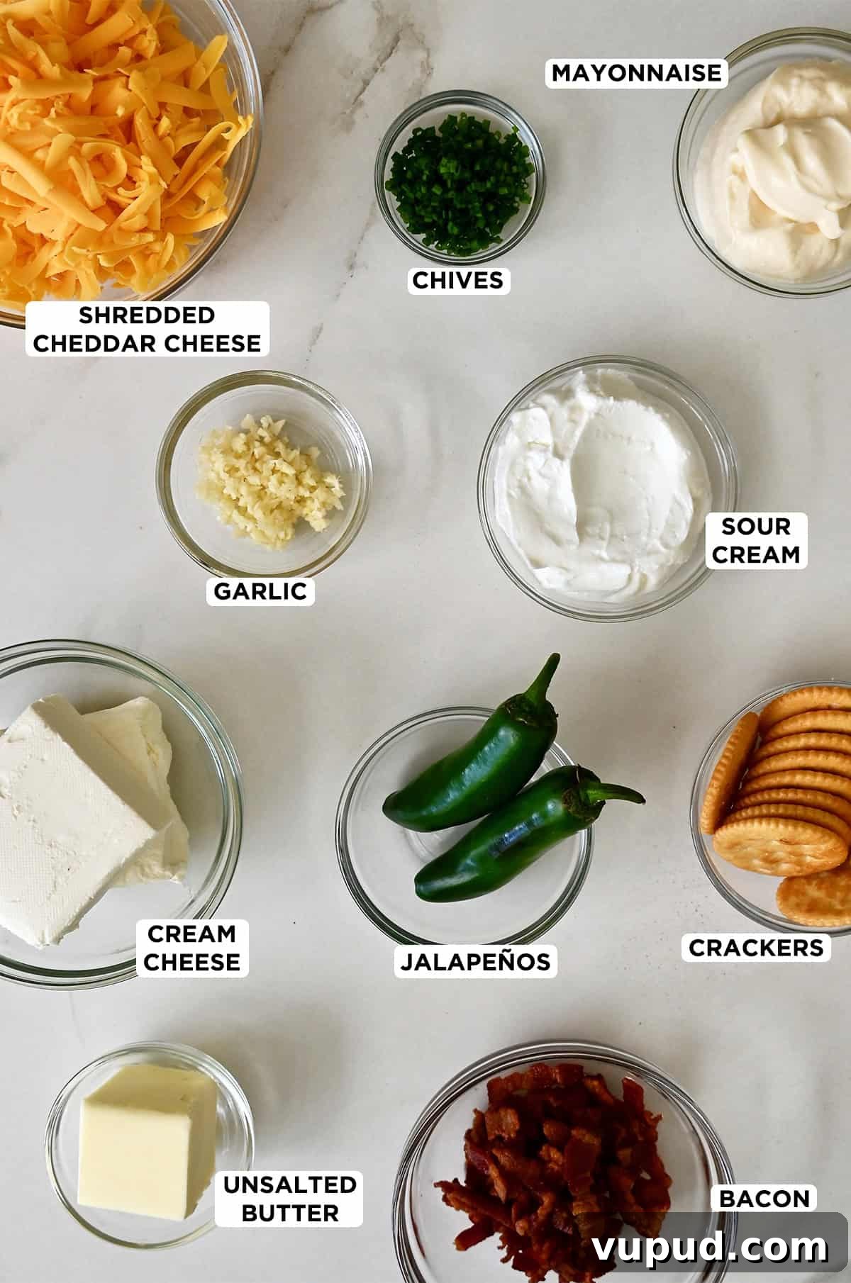 Creamy Jalapeño Popper Dip Recipe for Parties and Game Day 3 Jalapeno popper dip ingredients in various sizes of glass bowls.