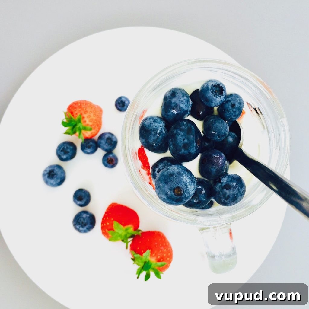 Avocado Green Eggs on Toast: Creamy Brunch Recipe 4 cereal sundae in a mason jar - layers of banana, greek yogurt, strawberries and blueberries