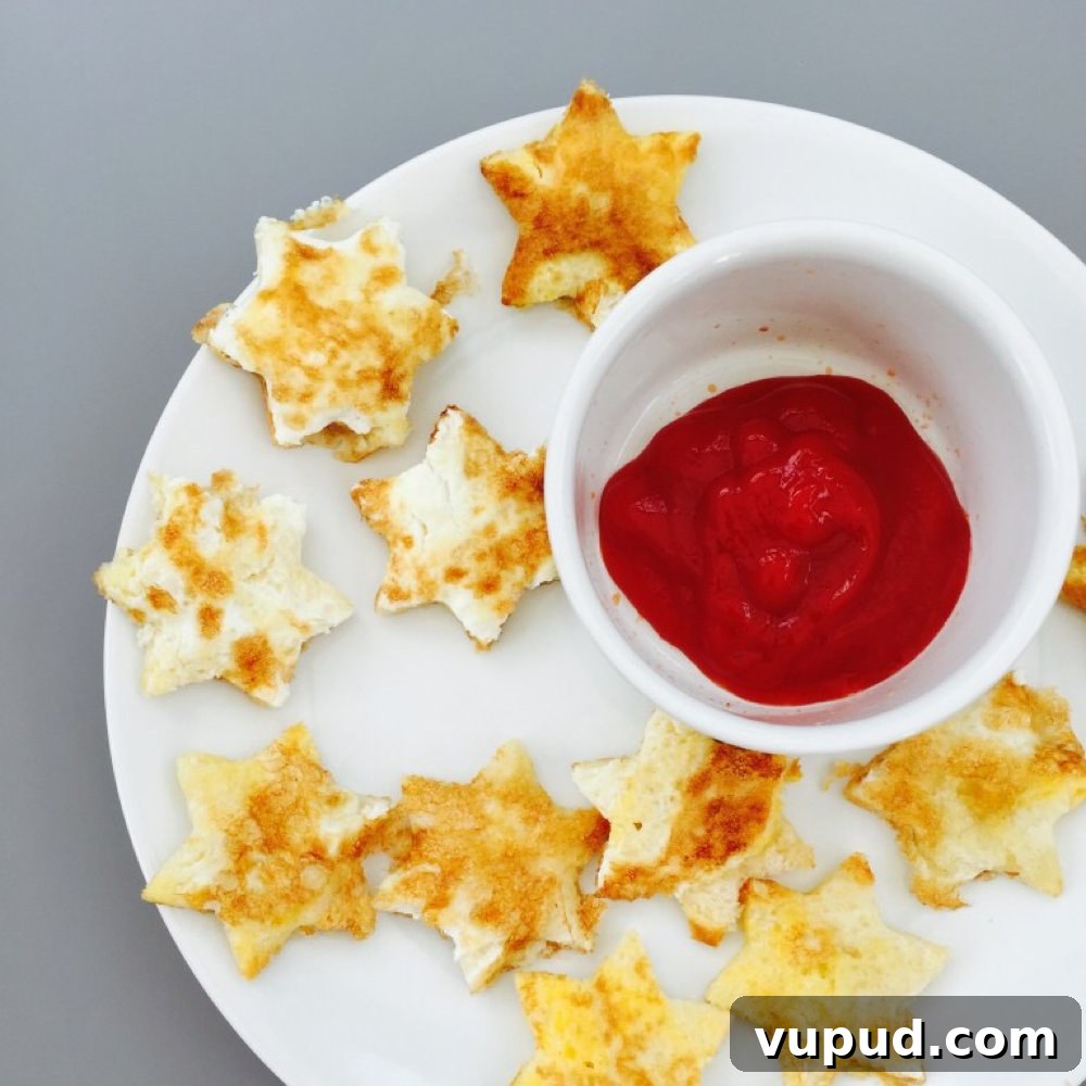 Avocado Green Eggs on Toast: Creamy Brunch Recipe 5 white plate with french toast stars and a small pot of tomato ketchup dip.