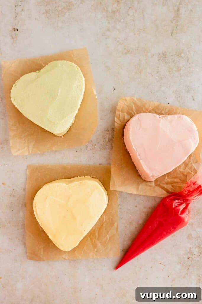 Red Velvet Mini Conversation Heart Cakes — Romantic Valentine Treats 19 pink, green, and pink pastel frosted mini heart cakes
