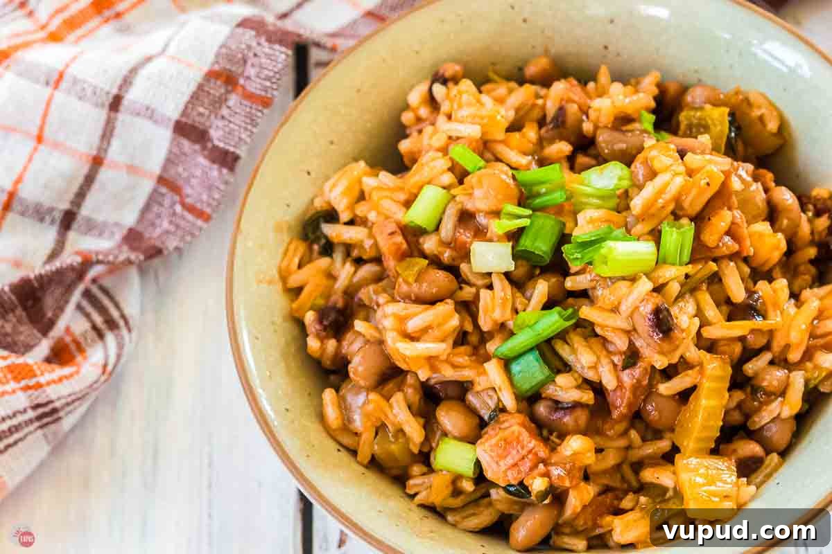 Slow Cooker Hoppin' John Recipe for Flavorful Southern Comfort 12 close up of bowl of black eyed peas and rice
