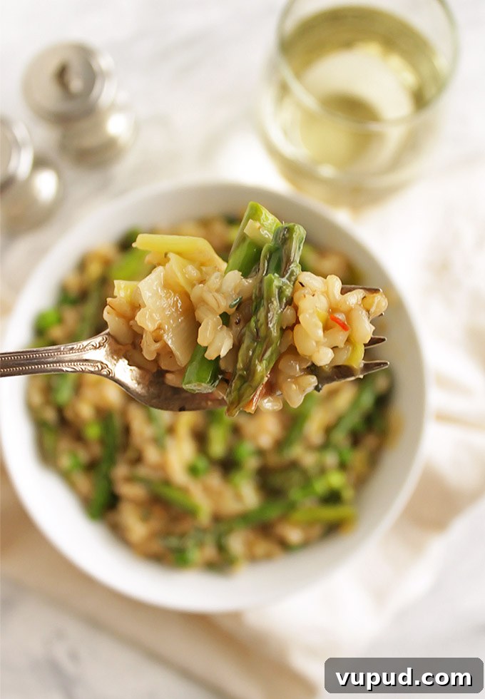 Spring Brown Rice Risotto with Fresh Herbs and Asparagus 7 Brown Rice Spring Risotto - Risotto made with brown rice for added health benefits and more texture. This risotto is packed with spring veggies like leeks, asparagus, and peas! This recipe makes a great side dish or add shrimp for a complete meal! Vegetarian/Gluten Free | robustrecipes.com