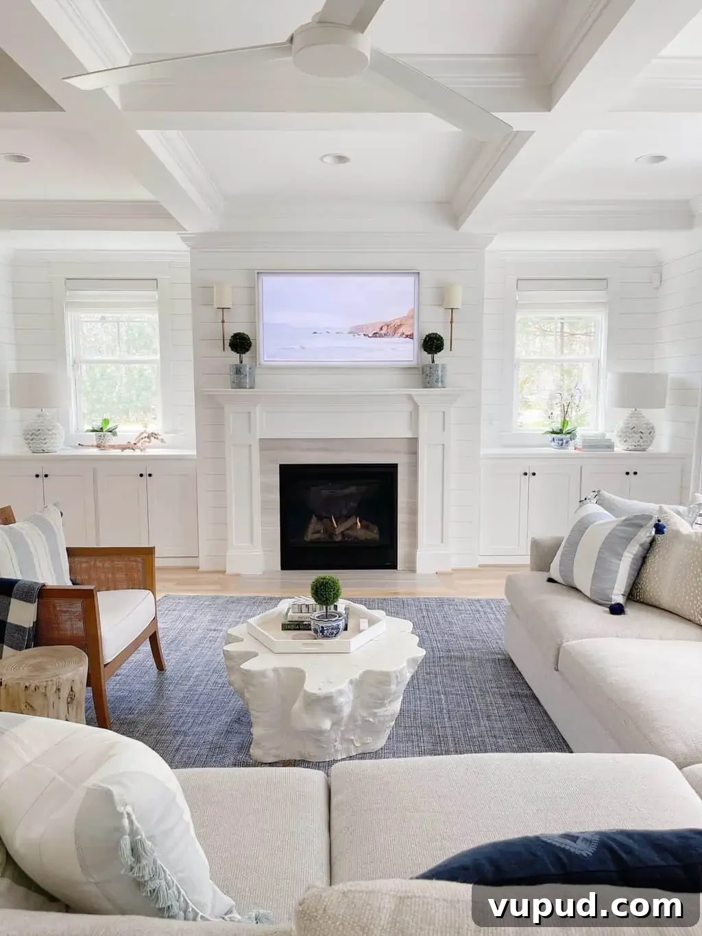 What Size Samsung The Frame TV Should You Mount Above a Fireplace? 3 a Samsung Frame tv in a 55