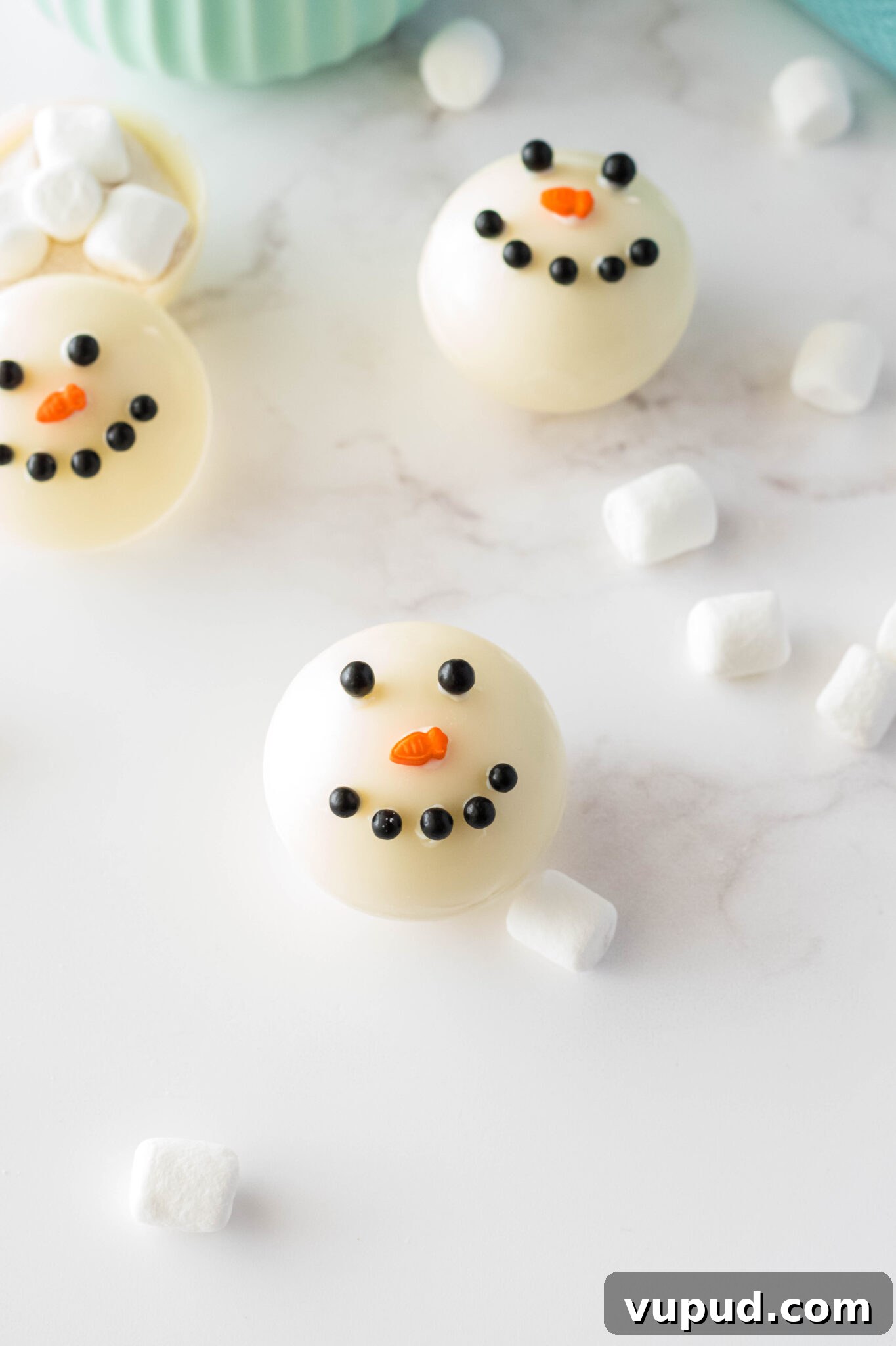 Snowman Hot Chocolate Bombs Recipe for Cozy Winter Drinks 4 snowman hot cocoa bomb near mug