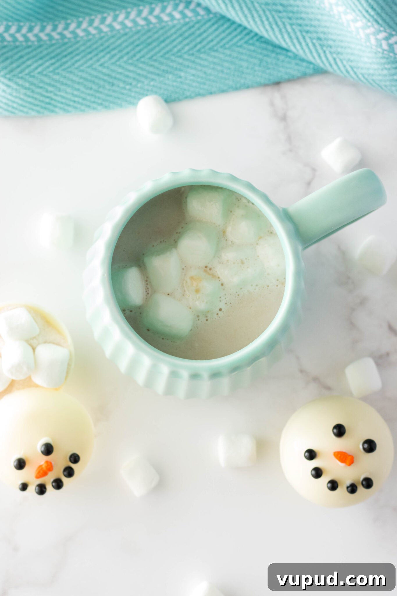 Snowman Hot Chocolate Bombs Recipe for Cozy Winter Drinks 8 hot cocoa bomb melted in a mug