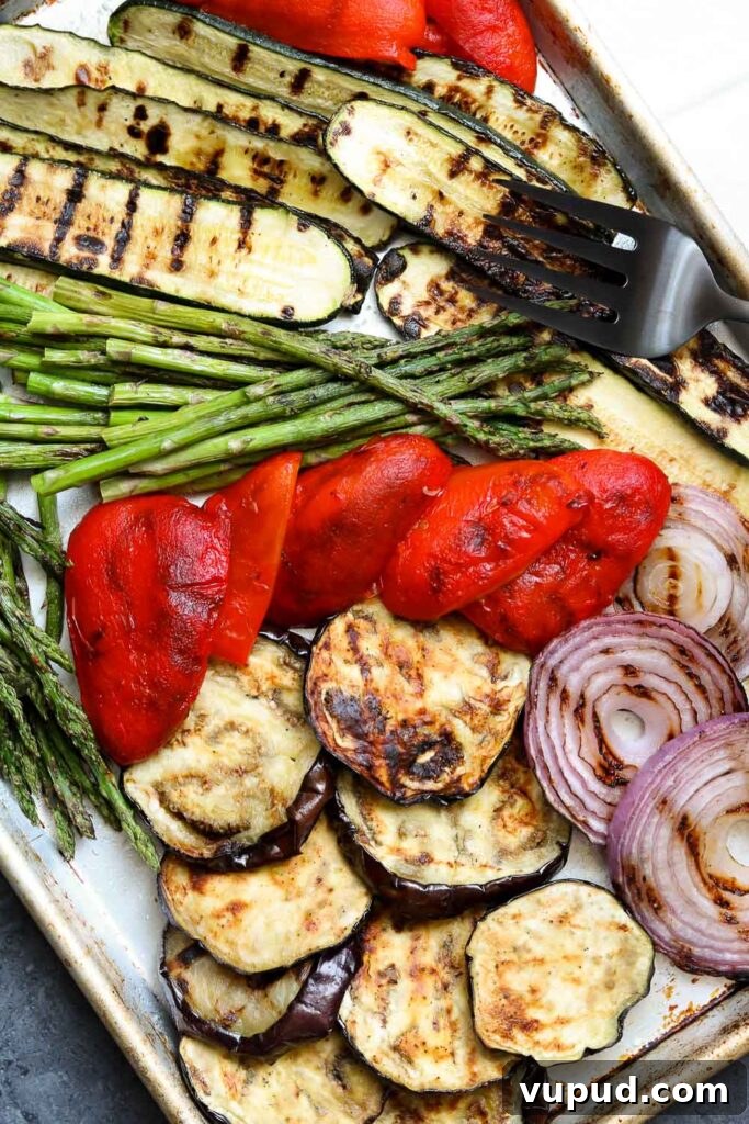 Grilled Vegetable Pasta with Feta and Lemon 3 grilled balsamic vegetables on sheet pan with serving fork