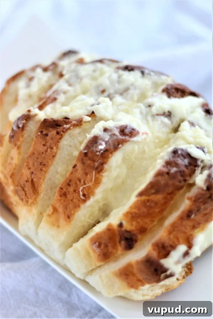Gluten-Free Cheesy Stuffed Bread Recipe for Homemade Comfort 2 gluten free cheesy bread on white platter