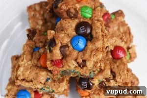 Chewy Monster Cookie Bars with M&Ms and Chocolate Chips 4 Monster Cookie Bars are a twist on the classic chewy peanut butter, oat and M&M cookies. They’re turned into bars to make them even denser!