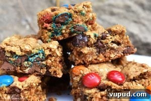 Chewy Monster Cookie Bars with M&Ms and Chocolate Chips 5 Monster Cookie Bars are a twist on the classic chewy peanut butter, oat and M&M cookies. They’re turned into bars to make them even denser!