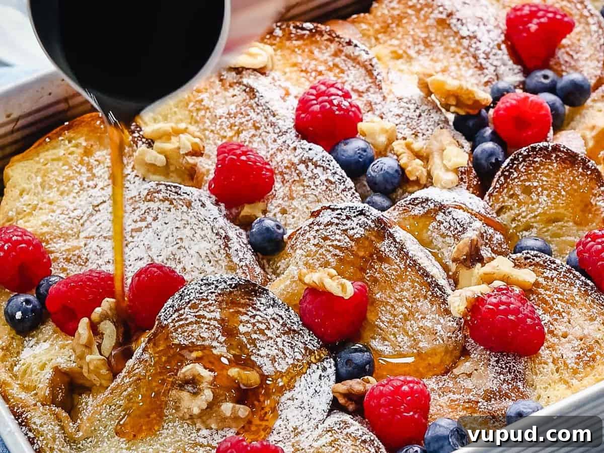 Make-Ahead Baked French Toast Casserole Recipe 10 Overnight baked French toast with a golden brown crunchy topping drizzled with maple syrup and topped with fruit.