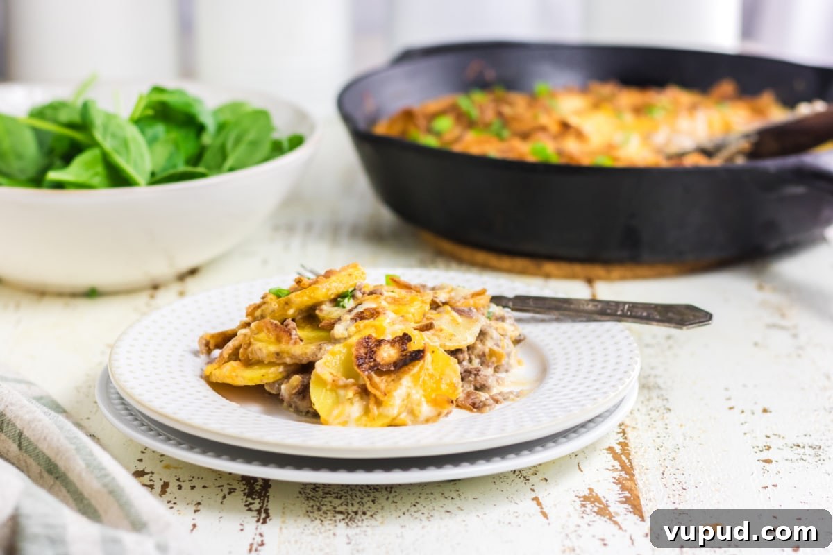 Classic Hobo Casserole Recipe for Hearty Weeknight Meals 8 A plate of casserole on the table with a salad.