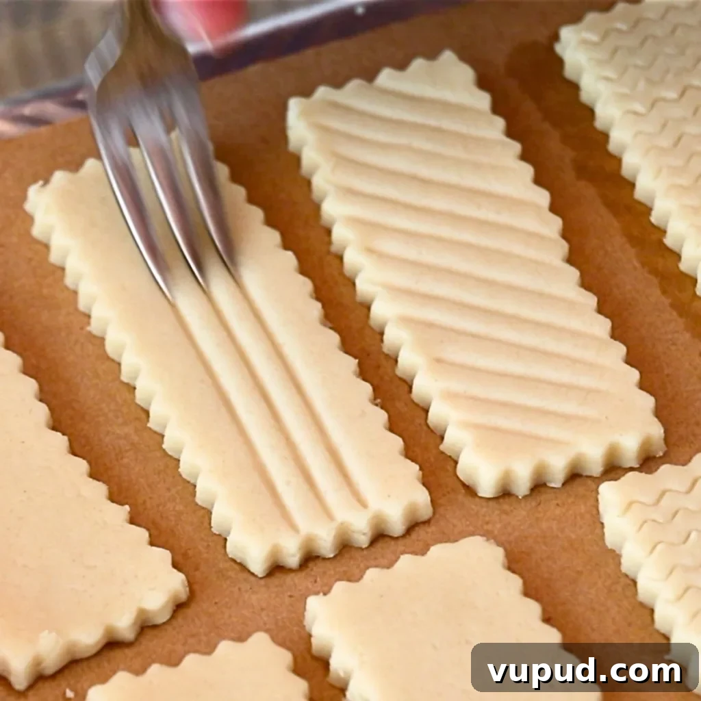 Classic Buttery Shortbread Cookies Recipe for Perfect Cookies 17 adding lines on shortbread cookie dough with a fork