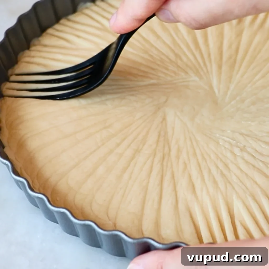 Classic Buttery Shortbread Cookies Recipe for Perfect Cookies 33 adding patterns with a fork to the edge of pressed shortbread cookies