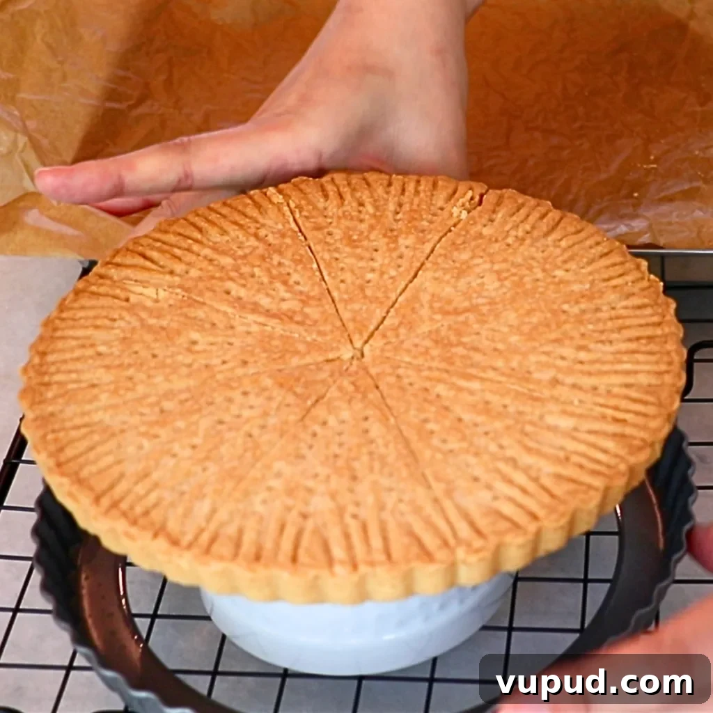 Classic Buttery Shortbread Cookies Recipe for Perfect Cookies 38 removing a tart pan from baked pressed shortbread cookies