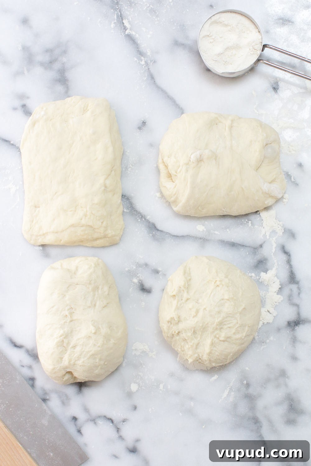 72-Hour Pizza Dough Recipe from Baking Steel 12 pizza dough divided into 4 equal parts