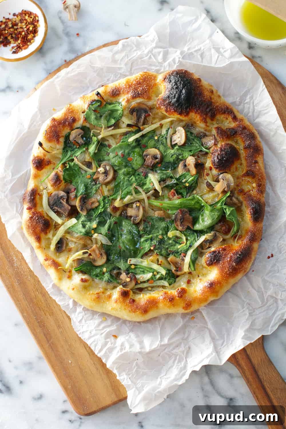 72-Hour Pizza Dough Recipe from Baking Steel 17 a top down shot of pizza made with 72 hour pizza dough on Baking Steel